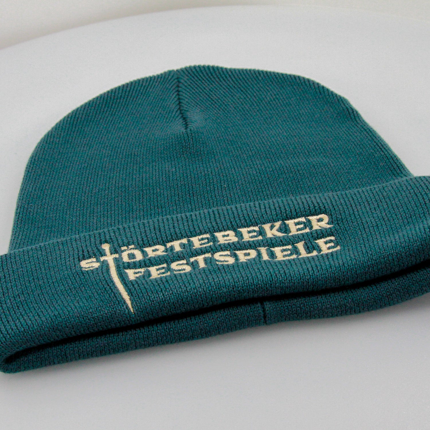 Störtebeker Mütze – „Logo Störtebeker Festspiele “ | Stick auf blau | grau oder petrol